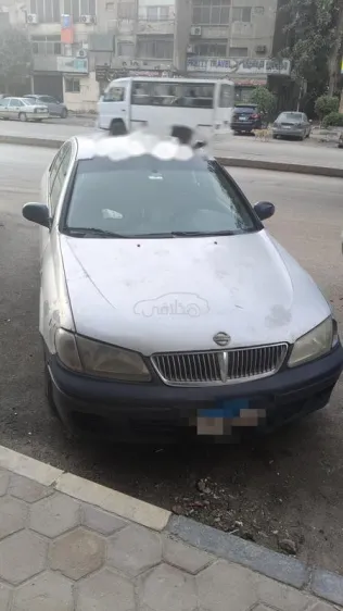 نيسان صنى 2002 فضي مستعملة للبيع