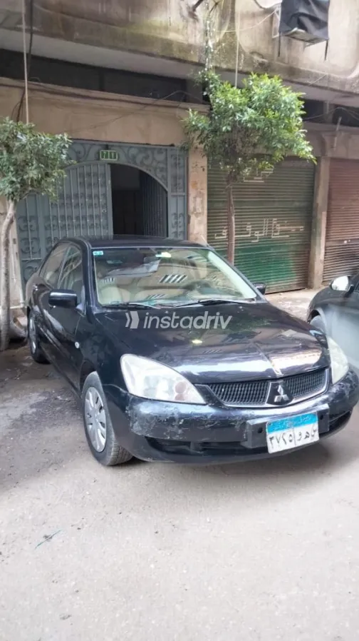 ميتسوبيشي لانسر 2007 أبيض مستعملة للبيع - 3