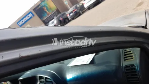 ميتسوبيشي لانسر 1998 فضي مستعملة للبيع - 7