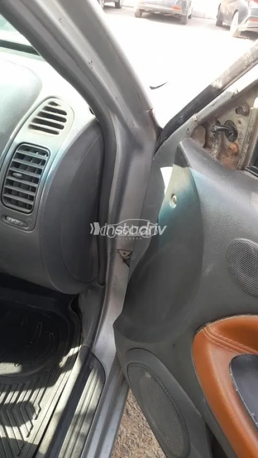 ميتسوبيشي لانسر 1998 فضي مستعملة للبيع - 8