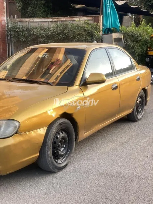 كيا سبكترا 2004 ذهبي مستعملة للبيع - 2