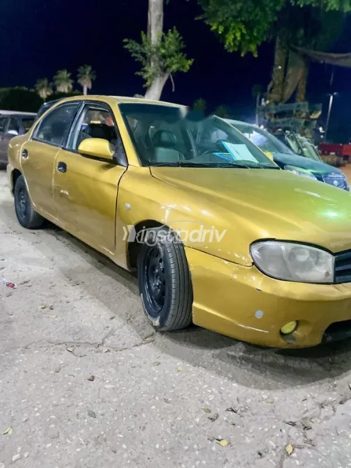 كيا سبكترا 2004 ذهبي مستعملة للبيع - 8