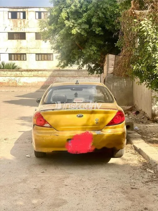 كيا سبكترا 2004 ذهبي مستعملة للبيع - 9