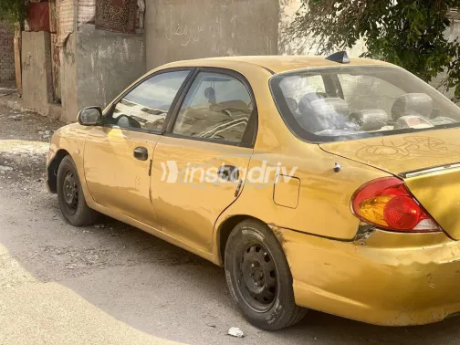 كيا سبكترا 2004 ذهبي مستعملة للبيع - 10