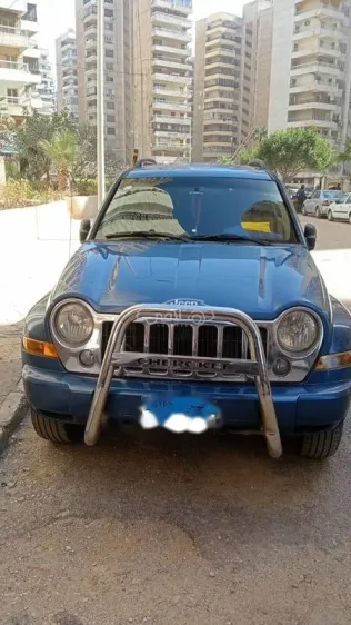جيب شيروكي 2006 أزرق مستعملة للبيع