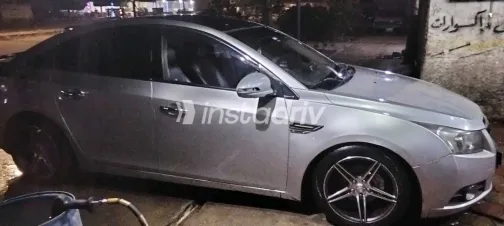 شيفروليه كروز 2010 أبيض مستعملة للبيع - 4