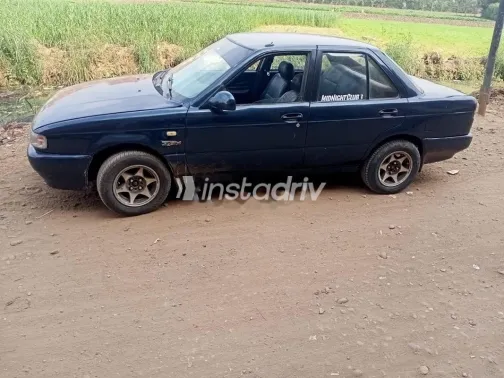 نيسان صنى 1990 أزرق غامق مستعملة للبيع - 2
