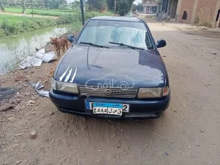 نيسان صنى 1990 أزرق غامق مستعملة للبيع