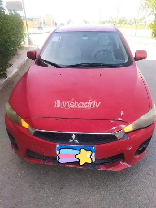 ميتسوبيشي لانسر اى اكس شارك 2017 أحمر غامق مستعملة للبيع - 2