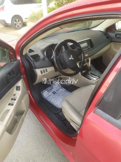 ميتسوبيشي لانسر اى اكس شارك 2017 أحمر غامق مستعملة للبيع - 6