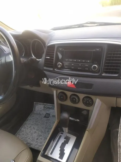 ميتسوبيشي لانسر اى اكس شارك 2017 أحمر غامق مستعملة للبيع - 8