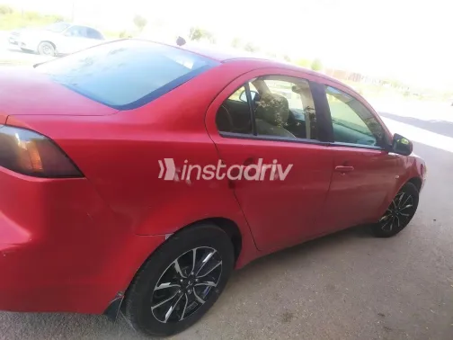 ميتسوبيشي لانسر اى اكس شارك 2017 أحمر غامق مستعملة للبيع - 9