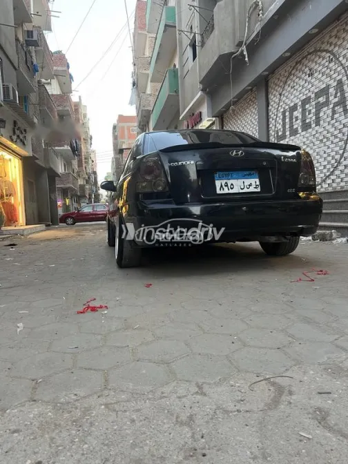 هيونداي فيرنا 2010 أسود مستعملة للبيع - 4