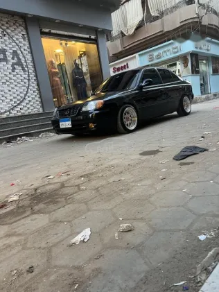 هيونداي فيرنا 2010 أسود مستعملة للبيع