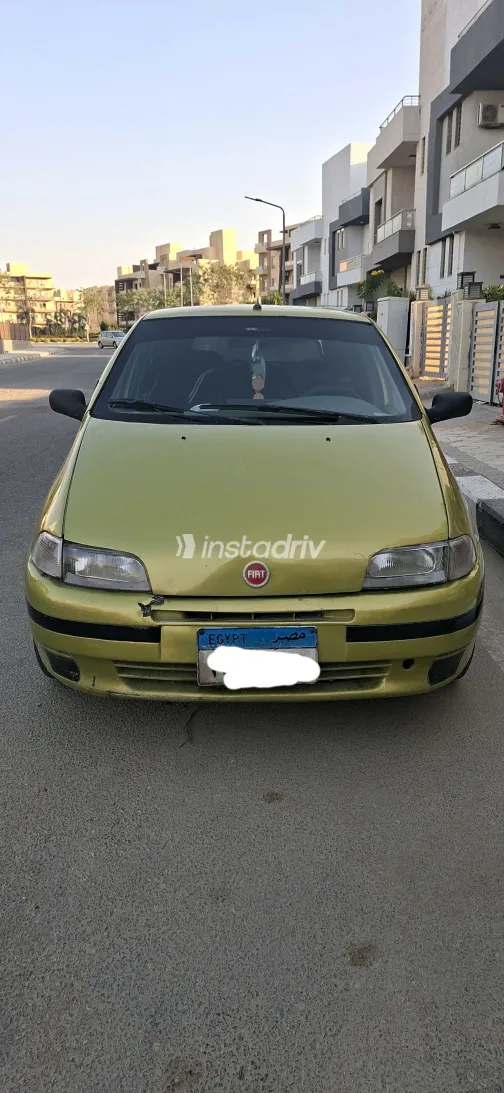 فيات بونتو 1994 أبيض مستعملة للبيع - 5