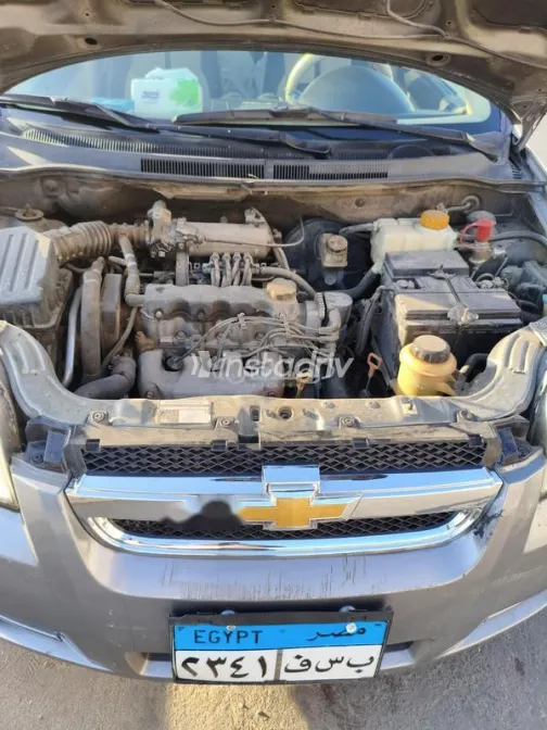 شيفروليه افيو 2013 رمادي مستعملة للبيع - 4