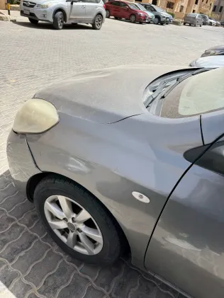 نيسان صنى 2014 أبيض مستعملة للبيع