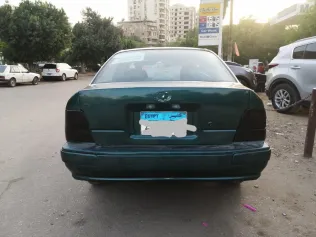 تويوتا كورولا 1996 أبيض مستعملة للبيع