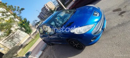 بيجو 206 2011 أزرق غامق مستعملة للبيع - 1