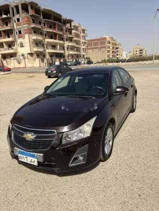 شيفروليه كروز 2015 أحمر غامق مستعملة للبيع