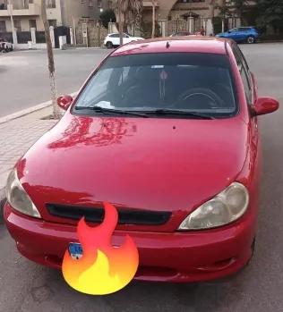 كيا ريو 2001 أحمر مستعملة للبيع