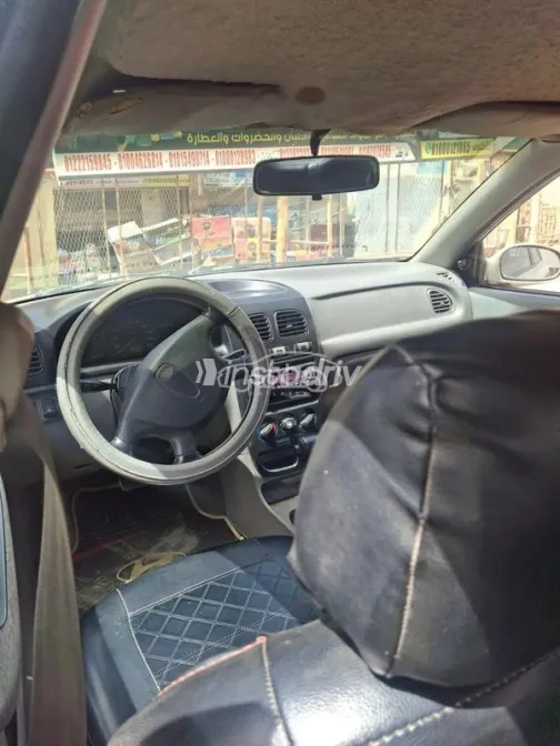 كيا ريو 2001 فضي مستعملة للبيع - 1