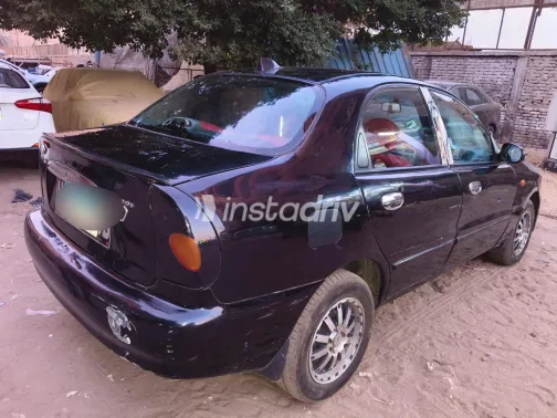 دايو لانوس 2002 أبيض مستعملة للبيع - 3