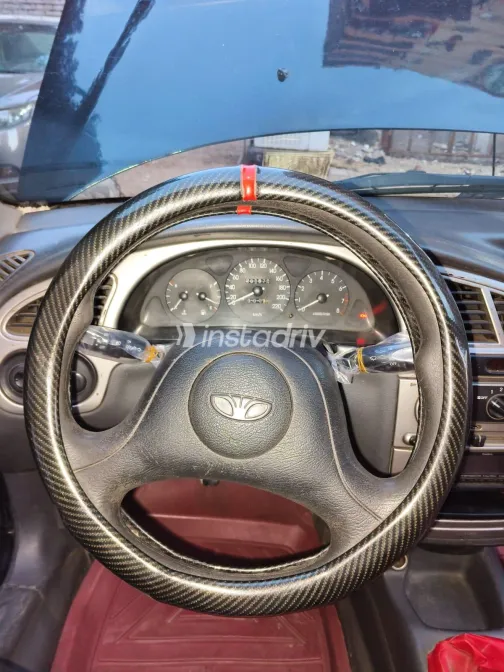 دايو لانوس 2002 أبيض مستعملة للبيع - 4