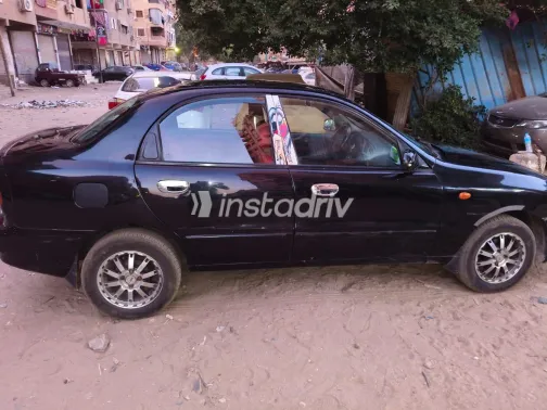 دايو لانوس 2002 أبيض مستعملة للبيع - 7