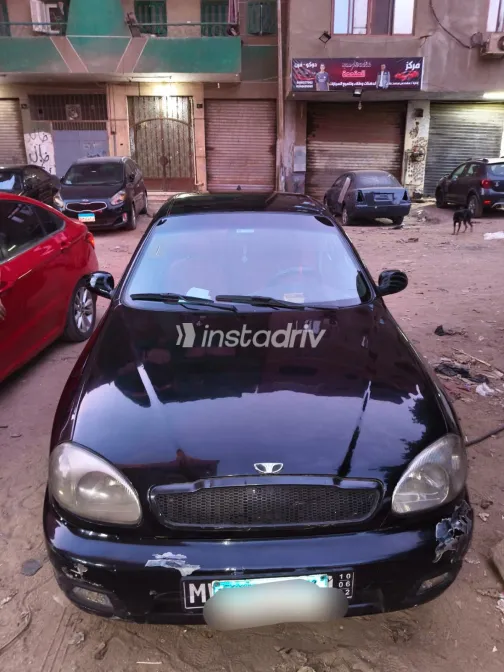 دايو لانوس 2002 أبيض مستعملة للبيع - 8