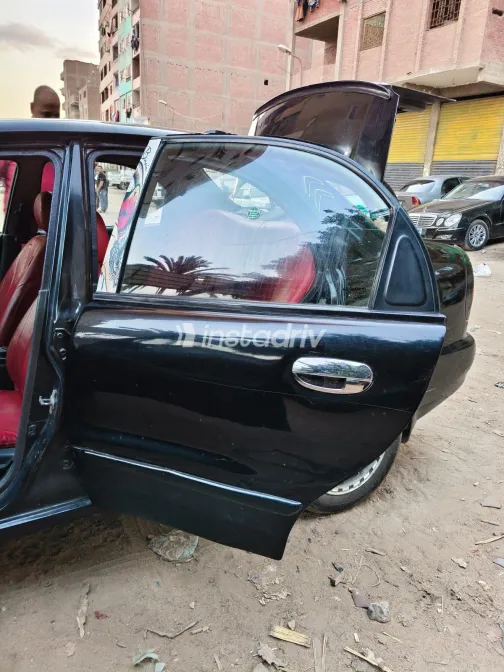 دايو لانوس 2002 أبيض مستعملة للبيع - 9