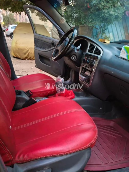 دايو لانوس 2002 أبيض مستعملة للبيع - 10