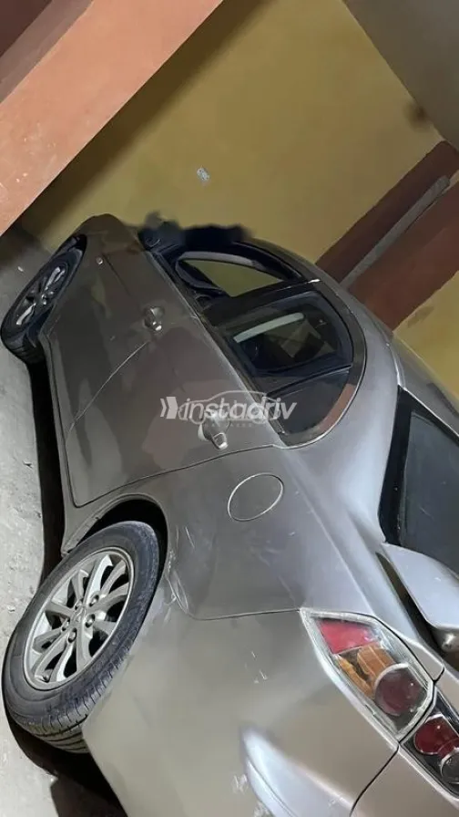 ميتسوبيشي لانسر اى اكس شارك 2014 ذهبي مستعملة للبيع - 1