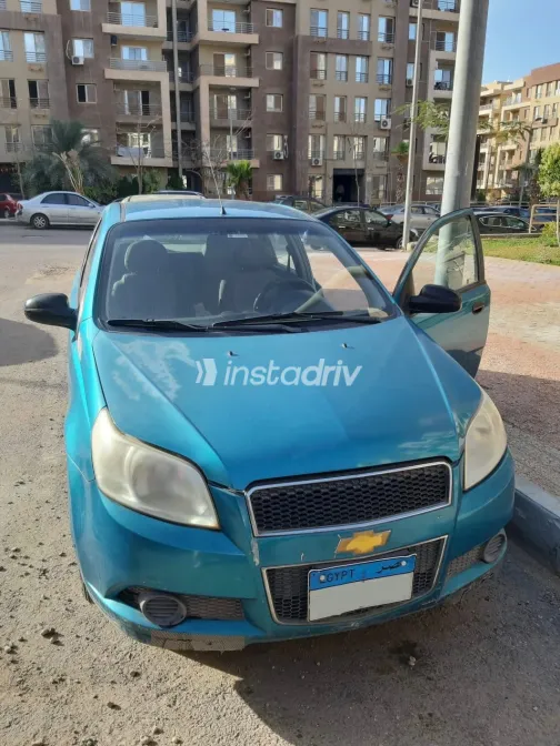 شيفروليه افيو 2009 أبيض مستعملة للبيع - 1