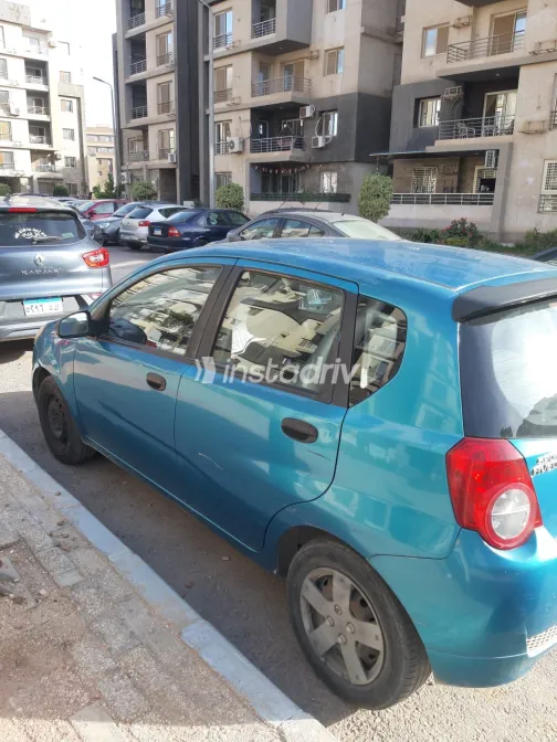 شيفروليه افيو 2009 أبيض مستعملة للبيع - 2