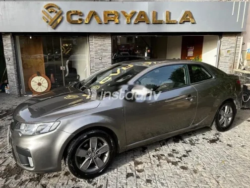 كيا سيراتو كوبيه 2010 رمادي مستعملة للبيع - 3