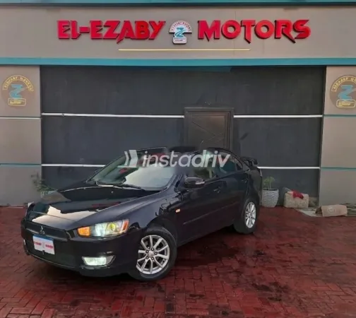 ميتسوبيشي لانسر 2015 أسود مستعملة للبيع - 1