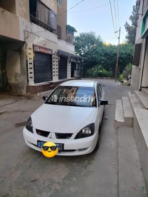 ميتسوبيشي لانسر بومة 2007 أبيض مستعملة للبيع - 1