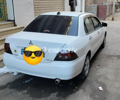 ميتسوبيشي لانسر بومة 2007 أبيض مستعملة للبيع - 2