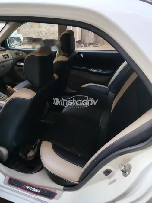 ميتسوبيشي لانسر بومة 2007 أبيض مستعملة للبيع - 4