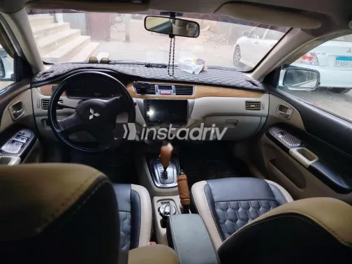 ميتسوبيشي لانسر بومة 2007 أبيض مستعملة للبيع - 5