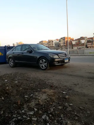 مرسيدس C 180 2009 أبيض مستعملة للبيع