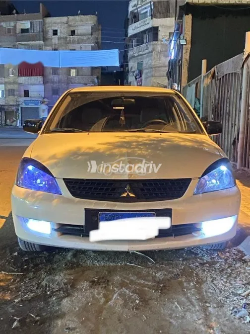 ميتسوبيشي لانسر بومة 2014 أبيض مستعملة للبيع - 2