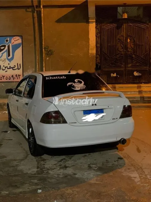 ميتسوبيشي لانسر بومة 2014 أبيض مستعملة للبيع - 5