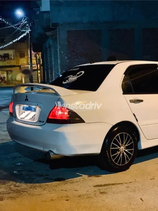 ميتسوبيشي لانسر بومة 2014 أبيض مستعملة للبيع - 6