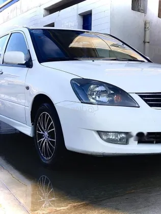 Mitsubishi Lancer Puma 2014 White Used for Sale