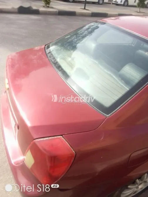 شيفروليه أوبترا 2008 أحمر غامق مستعملة للبيع - 1