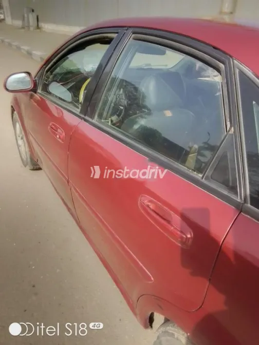 شيفروليه أوبترا 2008 أحمر غامق مستعملة للبيع - 4