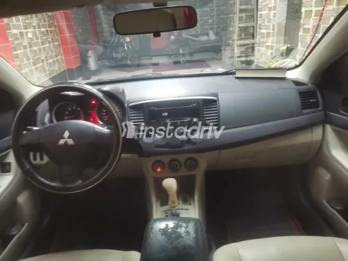 ميتسوبيشي لانسر اى اكس شارك 2015 فضي مستعملة للبيع - 2