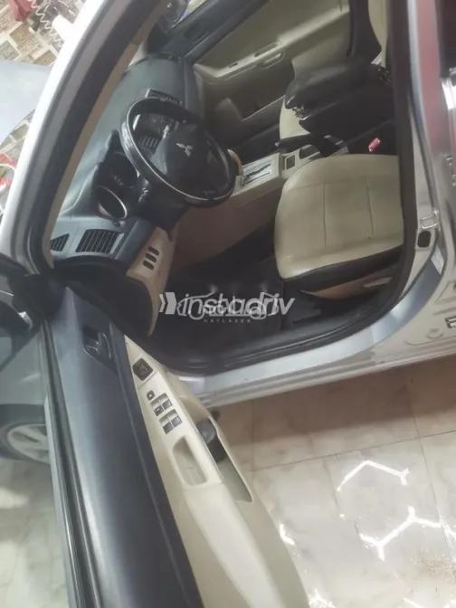 ميتسوبيشي لانسر اى اكس شارك 2015 فضي مستعملة للبيع - 5